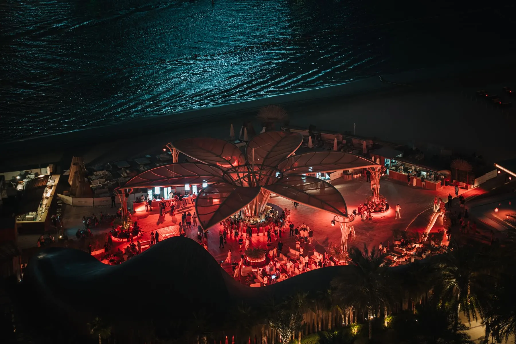 Night view over the crowd and the red-lit venue — Sonny Fodera — Bohemia, FIVE Palm Jumeirah, Dubai — Agency Verse