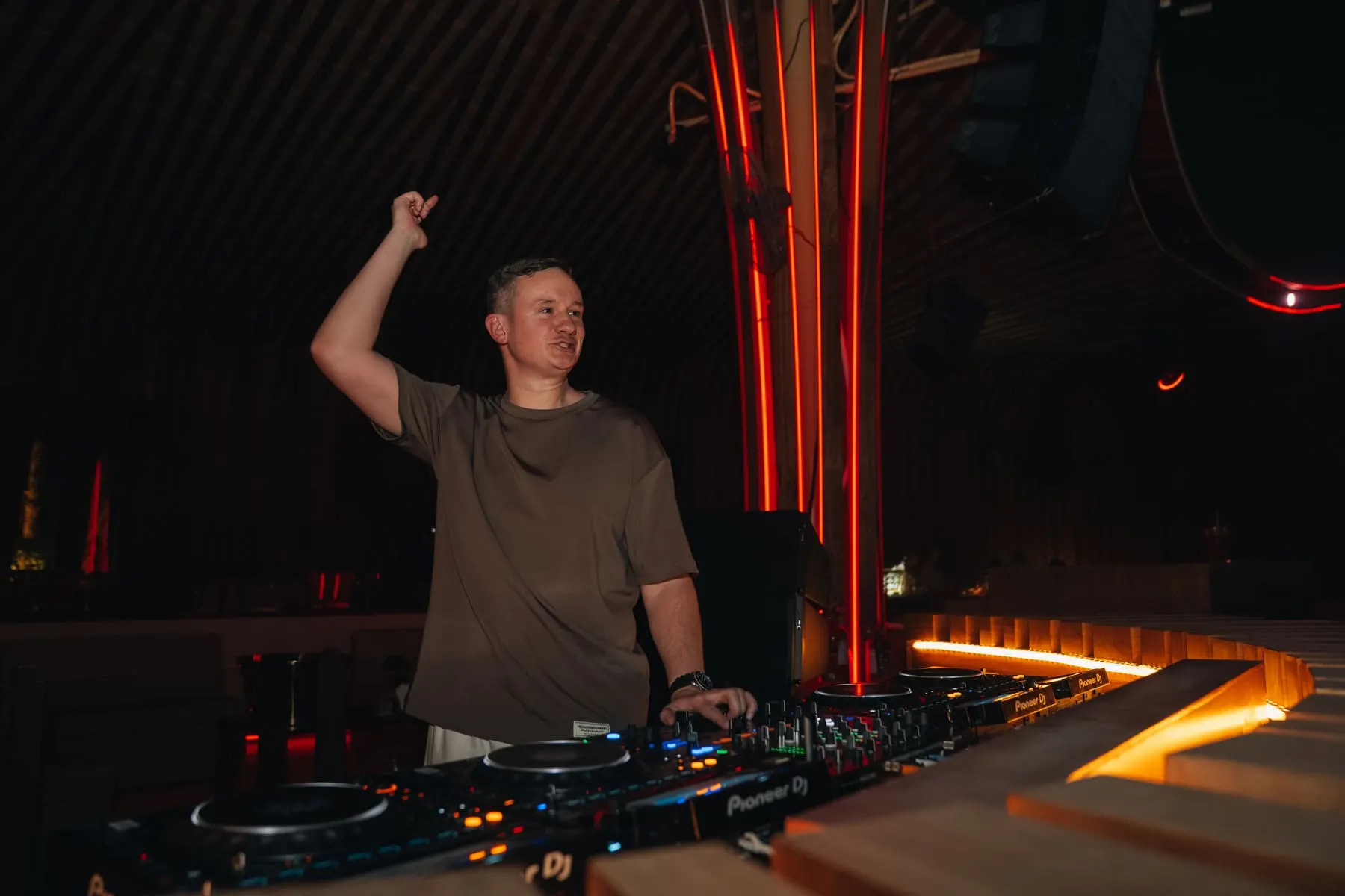 DJ raising a hand at the booth — Lost Frequencies — FIVE Bohemia 2026, FIVE Palm Jumeirah, Dubai — Agency Verse