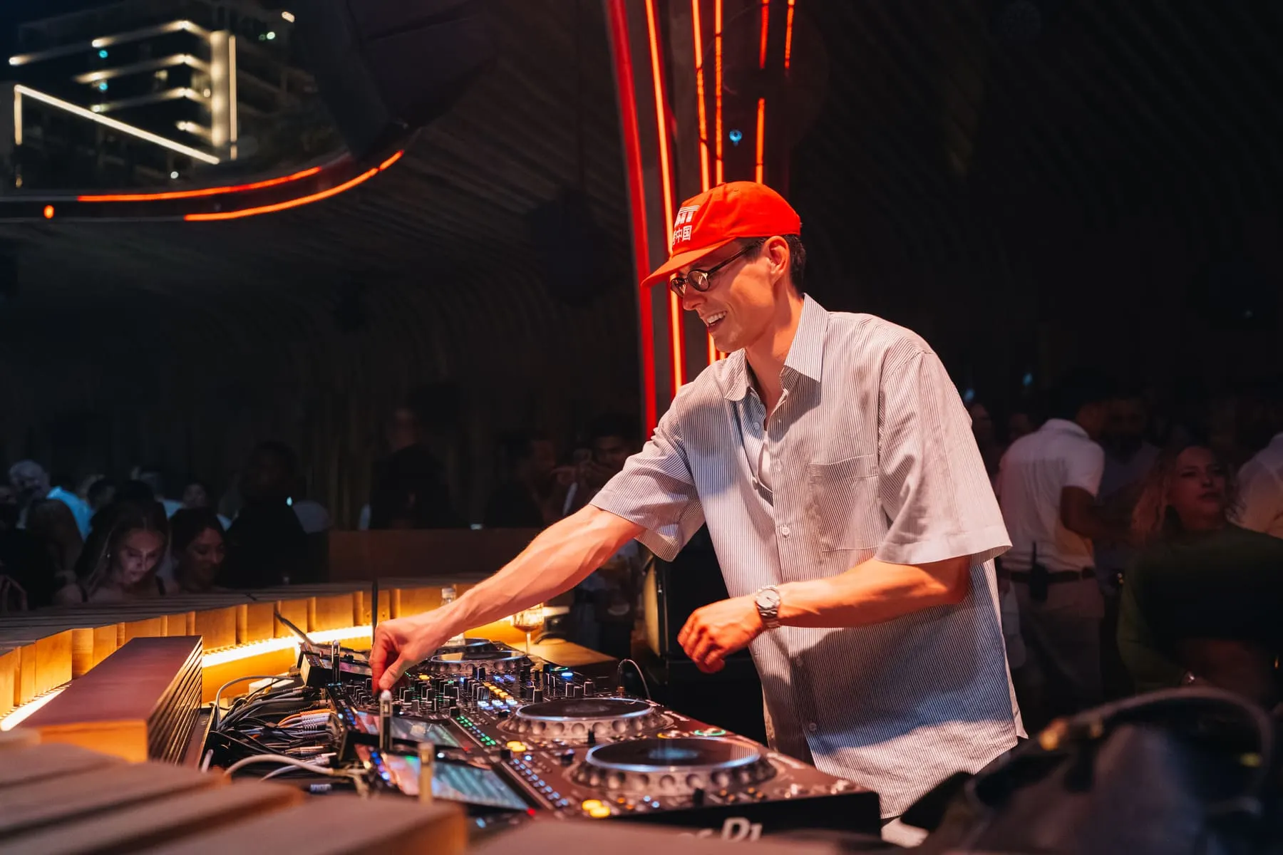 DJ in a red cap playing at the booth — Lost Frequencies — FIVE Bohemia 2026, FIVE Palm Jumeirah, Dubai — Agency Verse