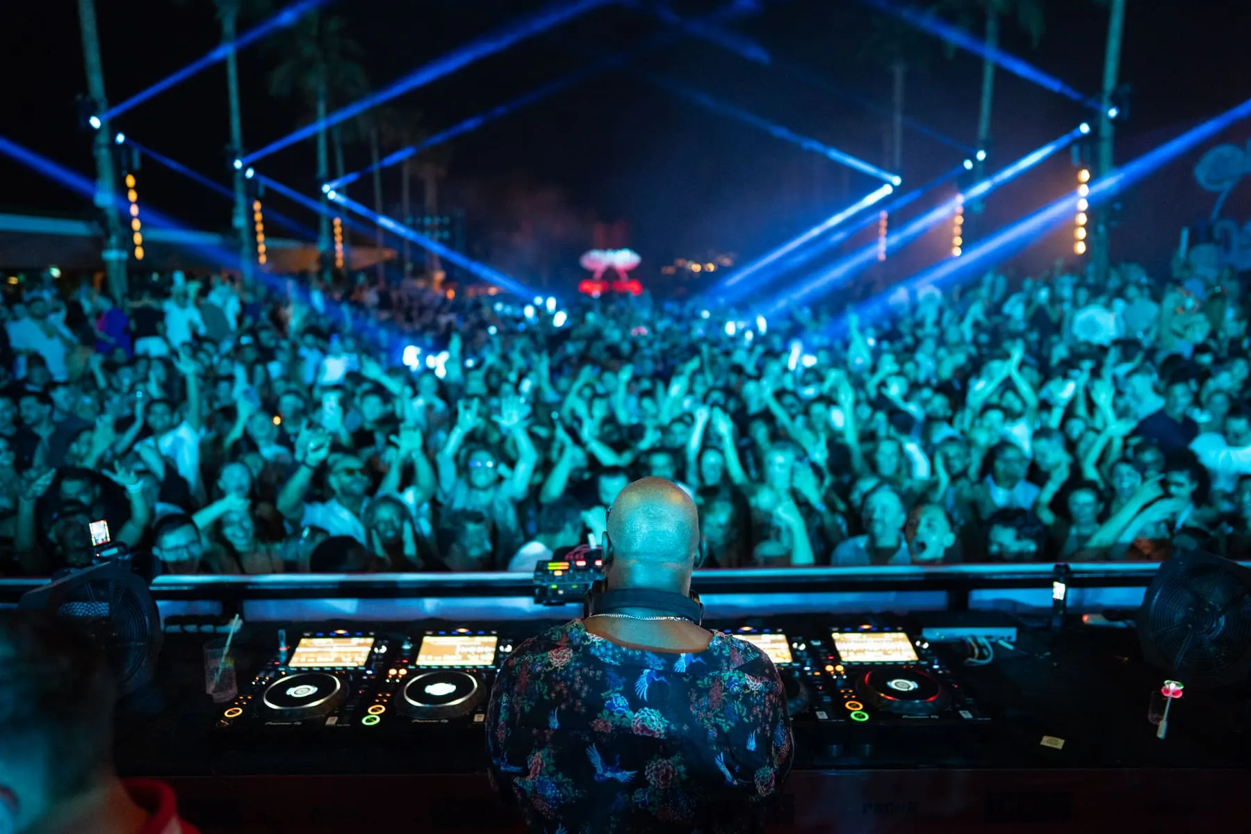 Crowd under blue stage light — Carl Cox — Pacha Icons, FIVE LUXE, FIVE LUXE JBR, Dubai — Agency Verse