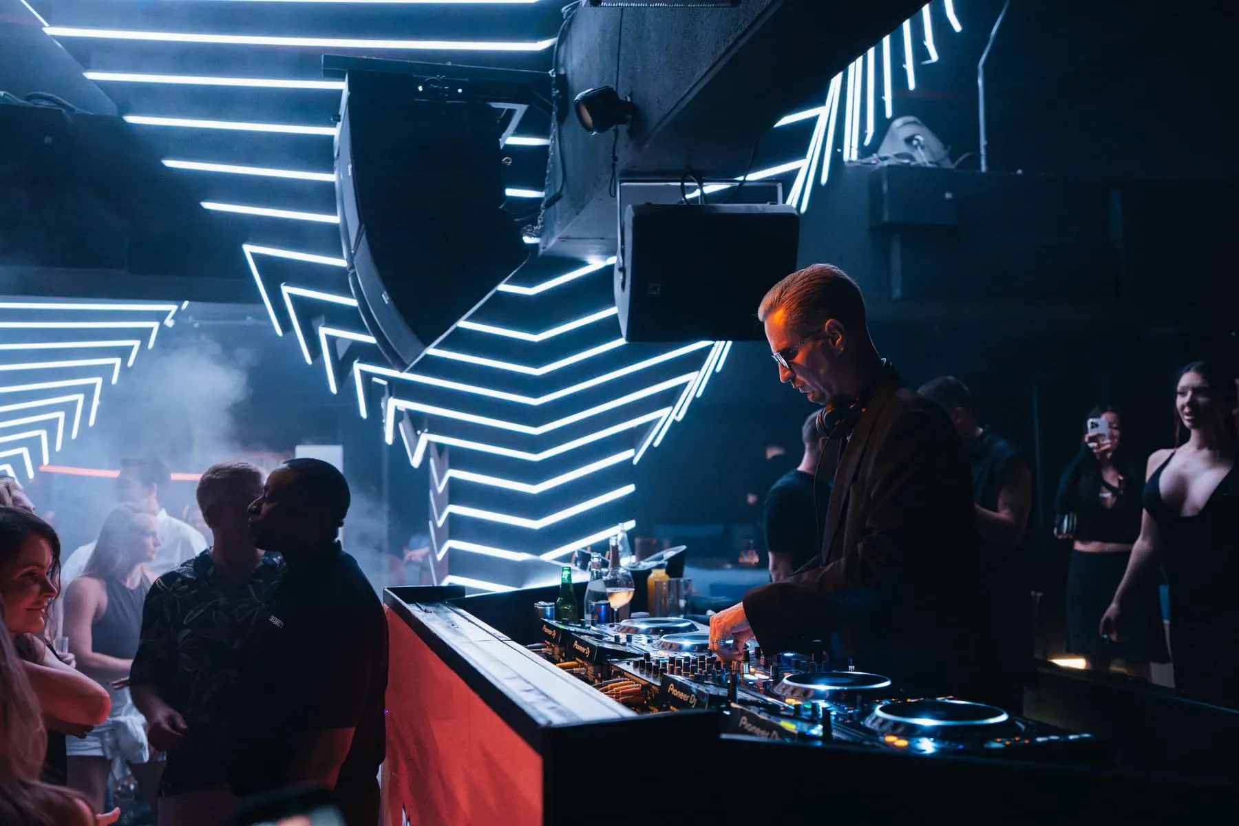 DJ booth under a geometric LED ceiling installation — FIVE Penthouse — Robin Schulz, Dubai — Agency Verse