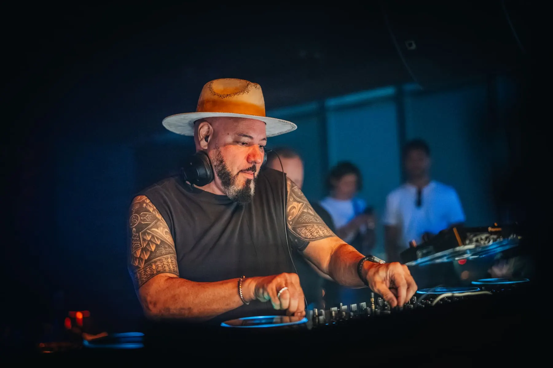 DJ in a wide-brim hat playing a set — FIVE Penthouse — Sanchez, Dubai — Agency Verse
