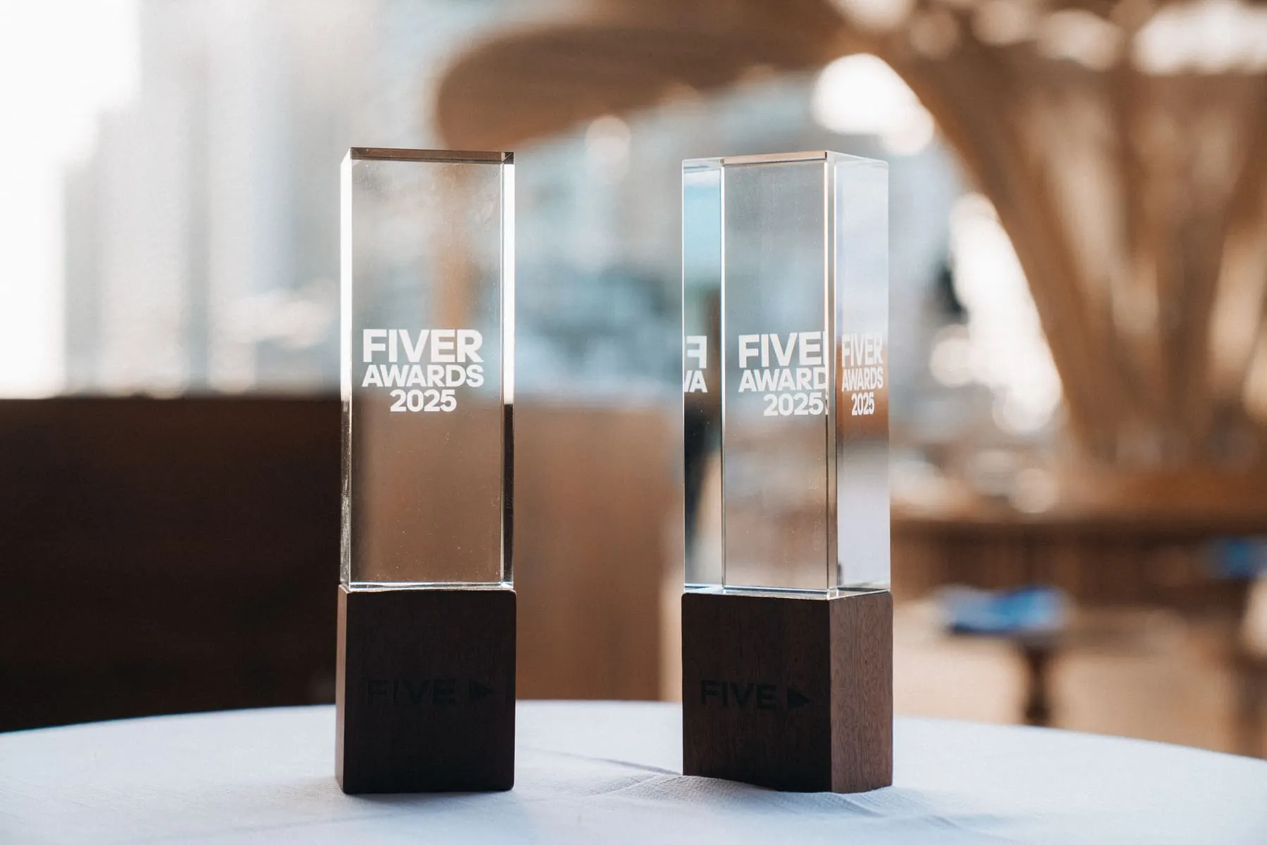 Glass FIVE Awards 2025 trophies on display — FIVE — Staff Awards, Dubai — Agency Verse