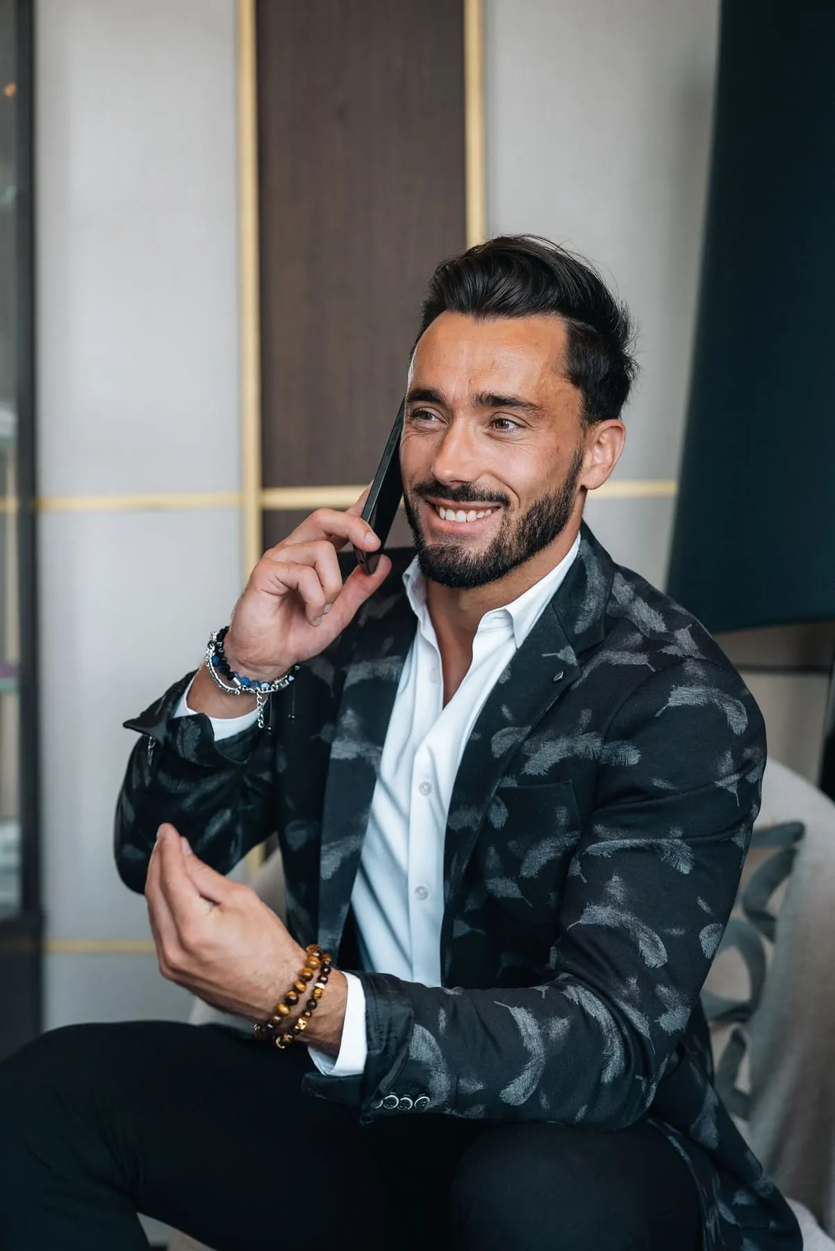 LinkedIn / X content systems — Smiling founder in a patterned blazer — GT Collection, Slovenia — Agency Verse