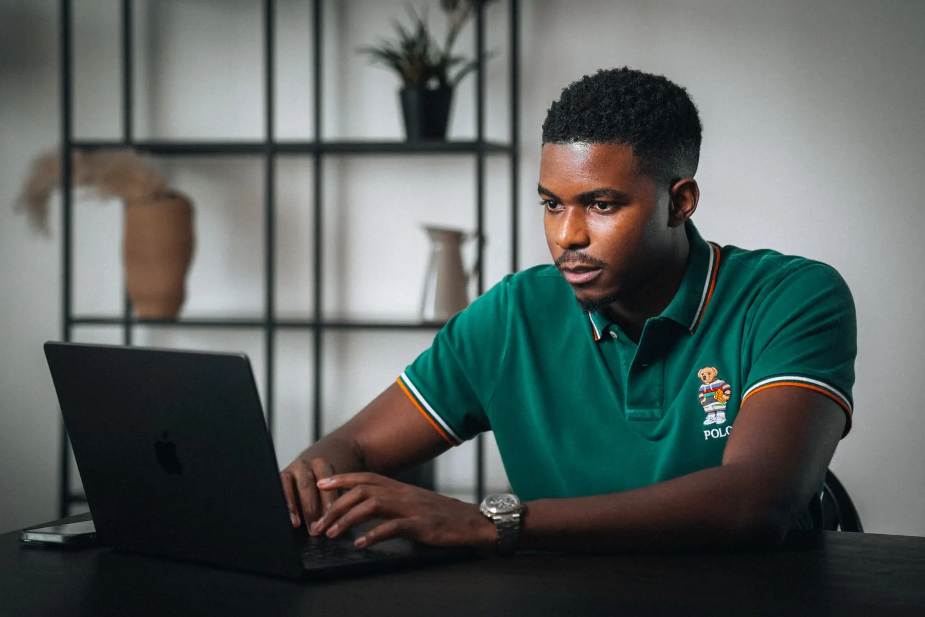 Jonathan working on a laptop in a styled studio — Jonathan Ecom — Agency Verse