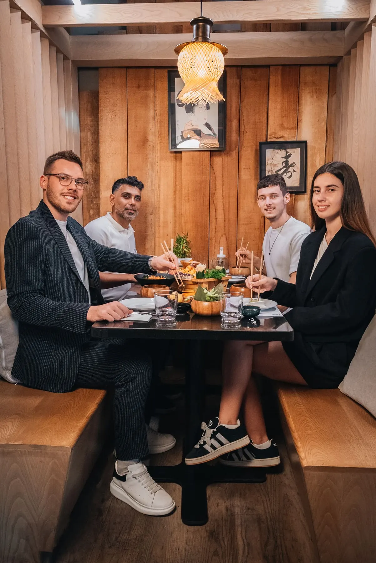 Guests dining at a table — Mizu, Downtown Dubai — Agency Verse